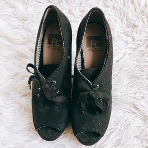 Peep toe wedge booties